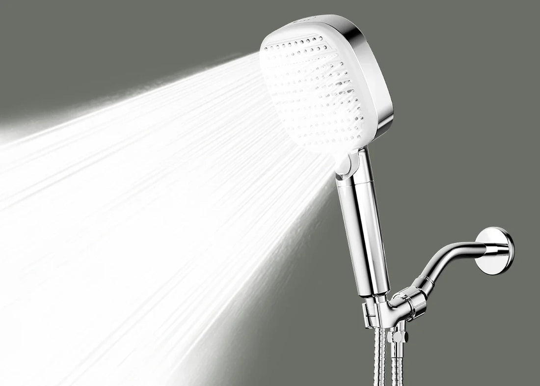 The LiberaQuar S-1 handheld shower head showing its broad Rain spray pattern.